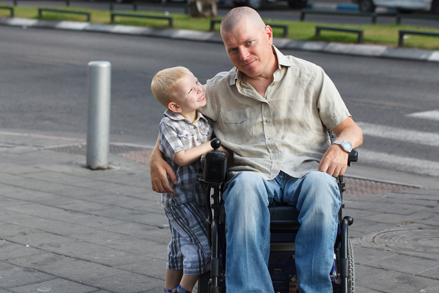 disabled man and son